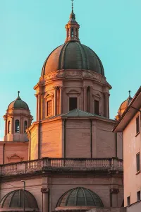 Naples Prints: Building features dome and towers of Santuario Madonna di Pompei in sunset light near Naples in Italy