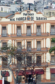 Cuban Prints: A building housing a cigar factory in central Havana, Cuba, West Indies, Central America