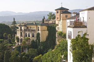 Buildings above the gorge, Ronda, one of the white villages, Malaga province Buildings above the gorge, Ronda, one of the white villages, Malaga province