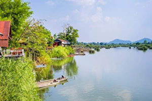 South East Asian Prints: Buildings along the Mekong River at Don Det, Si Phan Don (Four Thousand Islands)