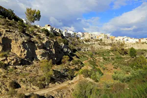 Clifftop Prints: Buildings perched on edge of clifftop, Sorbas, Almeria, Andalusia, Spain, Europe