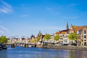 Haarlem Prints: Buildings along the Spaarne River with Gravestenenbrug drawbridge, Haarlem, North Holland