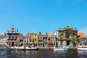 Traditionally Dutch Prints: Buildings along the Spaarne River, including the Teylers Museum on the right, Haarlem