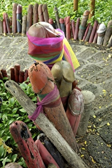 Formerly built to re-house the spirit from the ficus tree, donations of phallic symbols have resulted in the shrine being dedicated to fertility, Chao Mae Tuptim (Shrine of the Goddess Tuptim), Bangkok, Thailand, Southeast