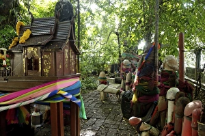 Formerly built to re-house the spirit from the ficus tree, donations of phallic symbols have resulted in the shrine being dedicated to fertility, Chao Mae Tuptim (Shrine of the Goddess Tuptim), Bangkok, Thailand, Southeast