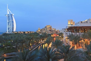 Jumeirah Beach Prints: Burj Al Arab viewed from the Madinat Jumeirah Hotel at dusk, Jumeirah Beach
