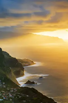 Pont Davignon Prints: Burning sky at sunset over Arco de Sao Jorge and Ponta Delgada villages ocean front