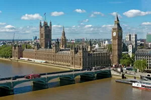 River Thames Gallery: Buses crossing Westminster Bridge by Houses of Parliament, London, England, United Kingdom, Europe