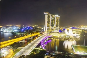 Busy roads leading to the Marina Bay Sands, Gardens by the Bay and ArtScience Museum at night