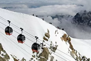 Images Dated 8th January 2000: Cable cars approaching Aiguille du Midi summit