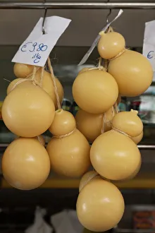 Hanging Prints: Caciocavallo cheese for sale in a market in Martina Franca, Puglia, Italy, Europe