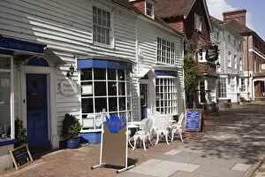 Cafe in 15th century white weatherboard building on High Street in historic town on the Weald