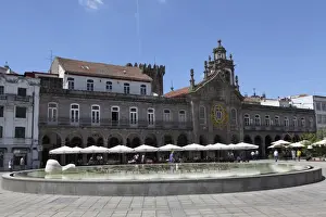 Minho Prints: Cafes stand in front of La Arcade and Igreja da Lapa church on the Praca da Republica