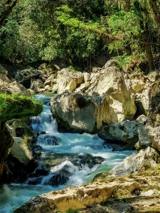 Alta Prints: Cahabon River flows over rocks near Semuc Champey Natural Monument in Lanquin