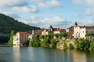 Lakeside Prints: Cahors riverside scene with buildings and hills in Midi-Pyrenees region of France