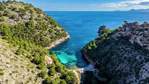 Cove Prints: Cala Murta beach offers clear water and rocky shores in Formentor peninsula