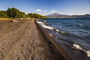 Shallow Prints: Calbuco Volcano, seen from a beach on Llanquihue Lake, Chilean Lake District, Chile