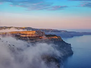 Fira Prints: Caldera and Fira City at foggy sunrise