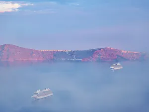 Voyages Prints: Caldera at foggy sunrise seen from Fira