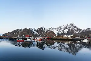 Fishing Village Prints: Calm water reflecting the Arctic landscape of the traditional fishing marina of Ballstad at dawn
