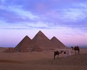 Camel riders at Giza Pyramids, Giza, UNESCO World Heritage Site, Cairo