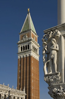 The Campanile with carved stone detail on the Palazzo Ducale, Venice, UNESCO World Heritage Site