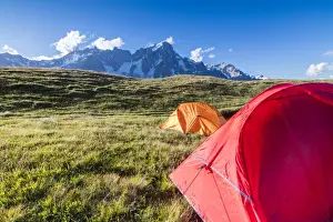 Graian Alps Prints: Camping tents in the green meadows with Mont De La Saxe in the background, Courmayeur