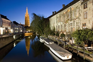 Canal in the evening and Church of our Lady, Bruges, Belgium, Europe Canal in the evening and Church of our Lady, Bruges, Belgium, Europe