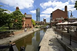 Images Dated 9th June 2008: Canal and lock keepers cottage at Castlefield with the Beetham Tower in the background