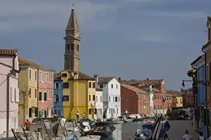 Multi Color Prints: A canal with pastel painted houses and the leaning tower of San Martino