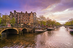 Traditionally Dutch Prints: Canal scene at dusk, Amsterdam, Netherlands, Europe