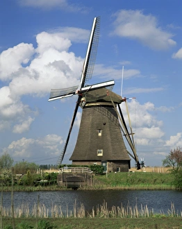 Kinderdijk Prints: Canal and windmill at Kinderdijk