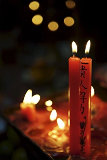 Images Dated 21st April 2007: Candle offerings in Buddhist temple, Ho Chi Minh City, Vietnam, Indochina