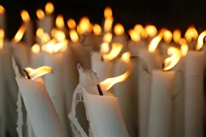 Lourdes Prints: Candles at the Lourdes shrine, Lourdes, Hautes Pyrenees, France, Europe