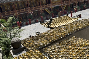 Sichuan Prints: Candles and novices, Nanwu temple, Kangding, Sichuan, China, Asia