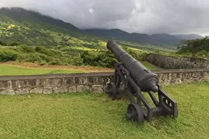 Cannon and green hills, Brimstone Hill Fortress, UNESCO World Heritage Site, St. Kitts, St