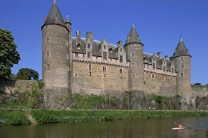 Chateau Prints: Canoe on the Odet River in front of the Josselin chateau in Brittany, France, Europe