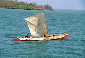 Rural Location Prints: Canoe with sail, River Gambia, the Gambia, West Africa, Africa