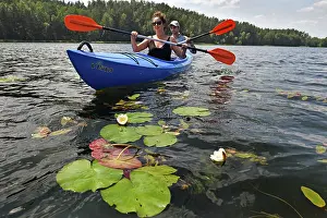 Kayaking Prints: Canoe trip among the nenufars (Nymphaea) on the lake Asekas around Ginuciai