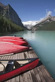 Images Dated 12th August 2011: Canoes for hire on Lake Louise, Banff National Park, UNESCO World Heritage Site
