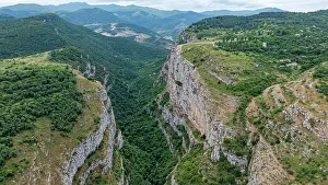 Altitude Prints: Canyon view showcasing the steep cliffs and lush greenery in Shusha, Qarabaqh, Azerbaijan