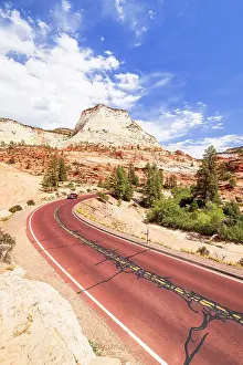 Routes Prints: A car driving along scenic road in Zion National Park on a sunny day