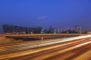 Images Dated 20th November 2007: Car light trails at the National Stadium, 2008 Beijing Olympic venue, Beijing