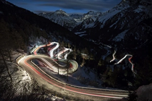 Engadine Prints: Car lights on the curvy Maloja Pass road at night