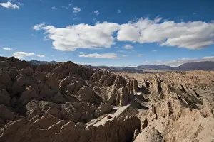 Transport Infrastructure Prints: A car passes through the stunning rock formations of the Quebrada de las Flechas