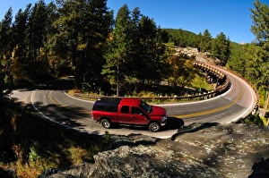 Rural Roads Prints: Car on the turn, Mount Rushmore, South Dakota, United States of America, North America