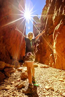 Northern Territory Prints: Carefree tourist woman enjoying the picturesque natural alleyway of Standley Chasm