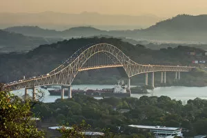 Rolling Landscape Collection: Cargo boat passes the Bridge of the Americas on the Panama Canal, Panama City, Panama