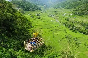 Images Dated 22nd April 2011: Cargo lift transporting people across the Hapao rice terraces, Banaue, UNESCO World Heritage Site