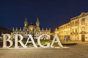 Light Beam Prints: Carlos Amarante square at night with illuminated 18th century Sao Marcos Church, Braga